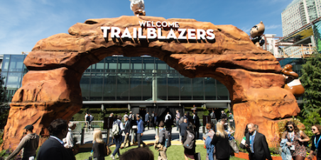 Photo: conference goers walking outside Moscone Center at Dreamforce 2018