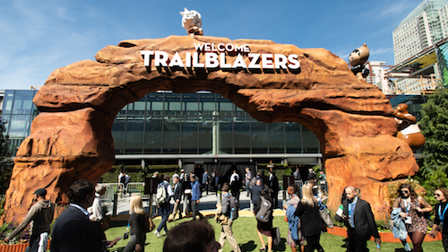 Photo: conference goers walking outside Moscone Center at Dreamforce 2018