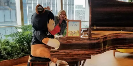 Photo: Salesforce Mascot Astro Plays the Piano