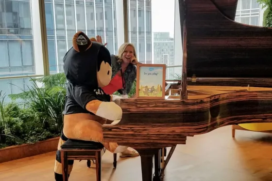 Photo: Salesforce Mascot Astro Plays the Piano