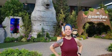 Photo of Skye Tyler in front of bear statue at Dreamforce 21