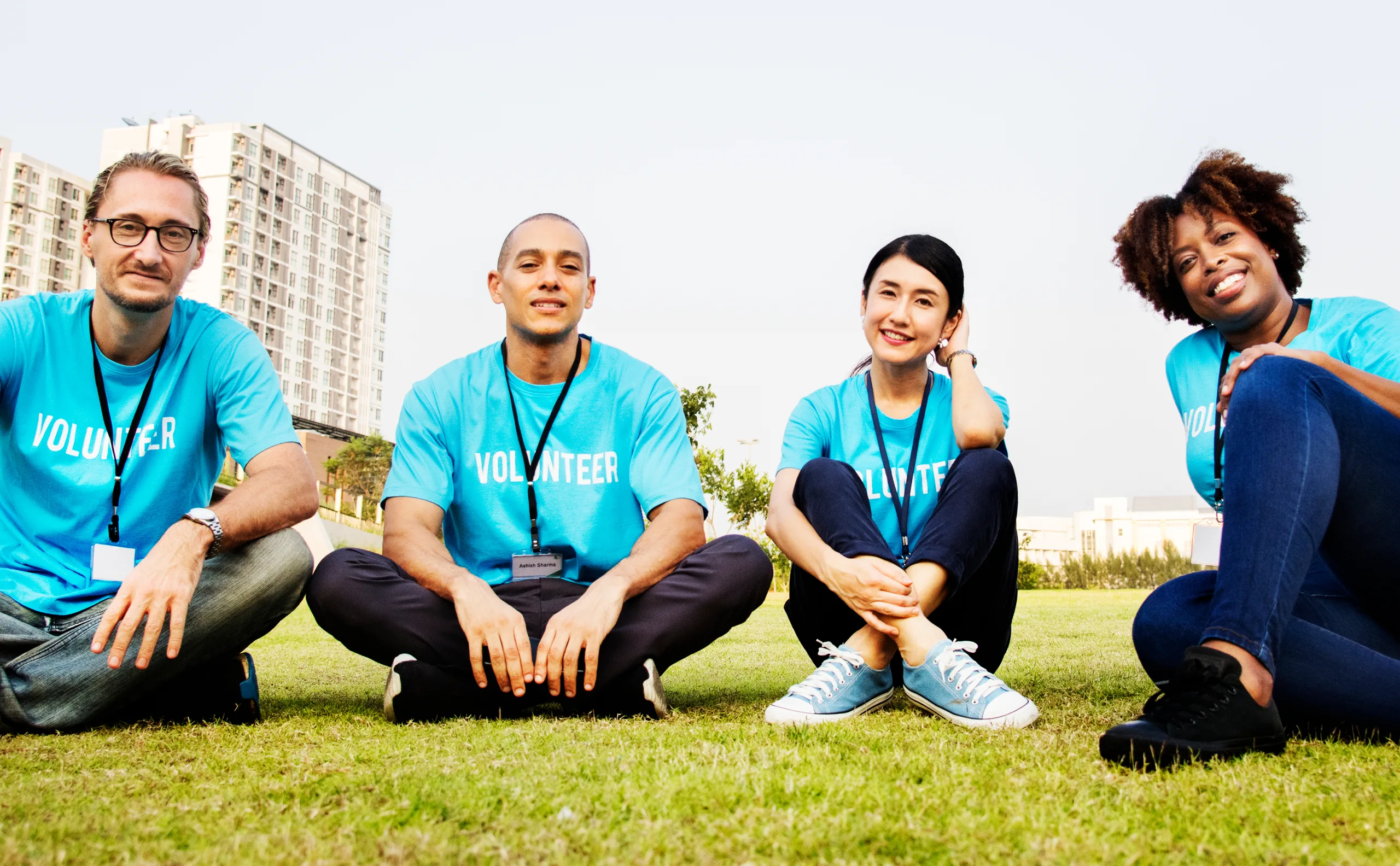 Group of volunteers sitting outdoors